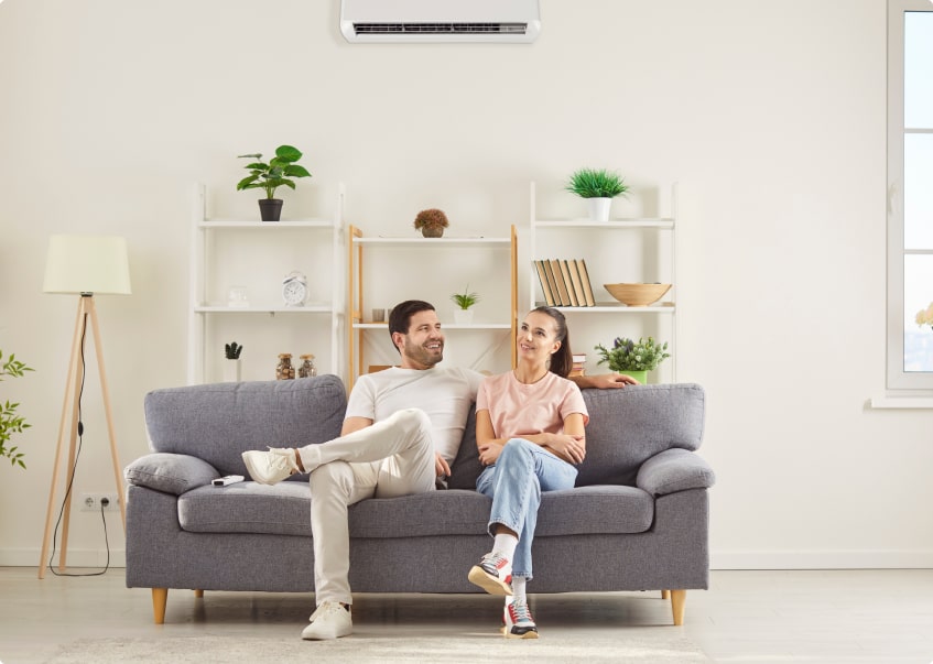 a couple sitting on a couch together